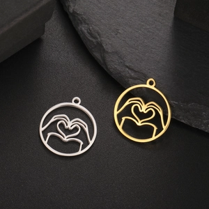 18K gold and silver hollow round heart gesture pendants in a minimalist jewelry design