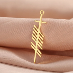 Golden stainless steel Celtic Ogham pendant with vertical geometric lines on silk fabric