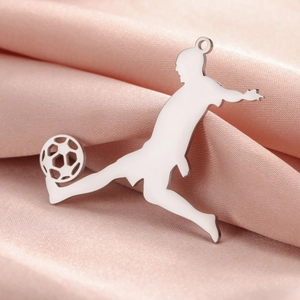 Polished silver stainless steel soccer player silhouette charm on pink silk fabric