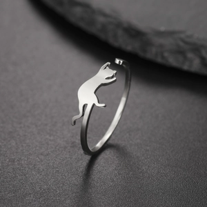 Macro shot of silver stainless steel adjustable ring with a cute cat silhouette design