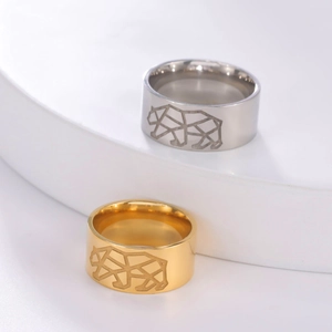 Polished 10mm titanium steel rings with geometric bear engraving in gold and silver