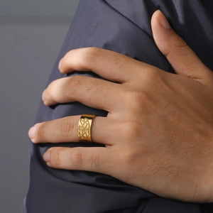 Mens 10mm wide gold stainless steel ring featuring geometric hollow cutout design