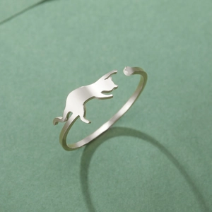 Minimalist adjustable stainless steel ring with a playful jumping cat silhouette