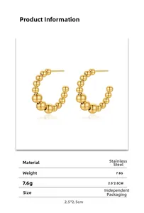 Detail showing dimensions and material of gold-plated stainless steel C-shaped earrings