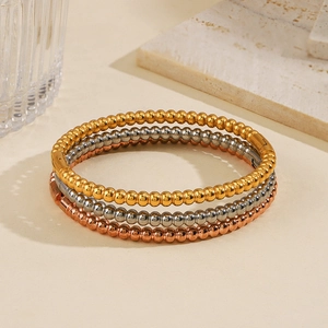 Set di tre bracciali a sfere in acciaio inossidabile color oro, argento e oro rosa