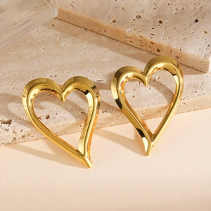 Polished gold 3D heart-shaped hollow earrings with bold geometric design for women