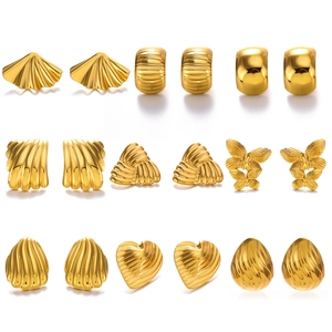 Set of nine minimalist gold stainless steel earrings in geometric and heart shapes