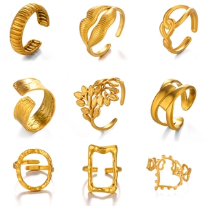 Set of nine minimalist gold-plated open rings featuring geometric and textured designs