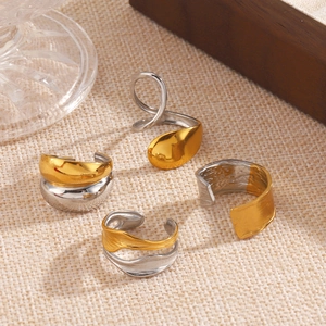 Minimalist 18K gold and silver plated stainless steel rings with fluid liquid metal design