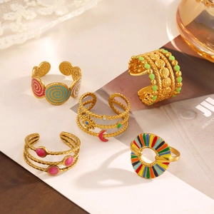 Set of five colorful enamel stainless steel rings with bohemian gold-plated designs