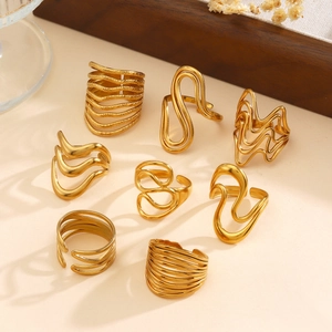 8-piece set of 18K gold plated stainless steel rings featuring wavy and geometric designs