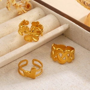 Three 18K gold-plated stainless steel open rings with flower, chain, and heart designs