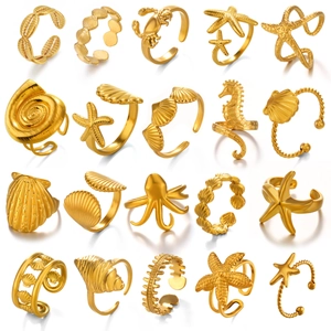 Golden ocean element starfish and seashell open rings set in a 20-piece collection