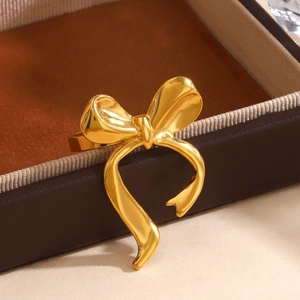 Bague luxueuse en acier inoxydable doré avec un design de nœud papillon en 3D