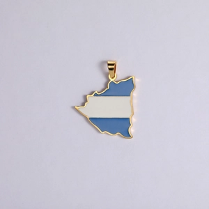 Detailed view of 18K gold plated Nicaragua map pendant with blue and white enamel inlay