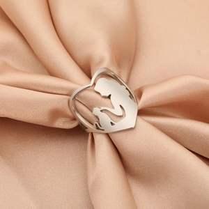 Silver stainless steel heart ring featuring a mother and child silhouette on silk background