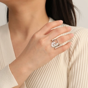 Polished stainless steel wide ring with heart cutout and mother child silhouette