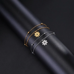 Ensemble de bracelets double couche en acier titane avec fleurs de marguerite