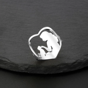 Silver stainless steel hollow heart ring featuring a mother and child silhouette design