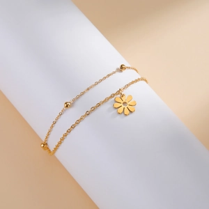 Bracelet double couche en or avec breloque marguerite et billes métalliques pour femme