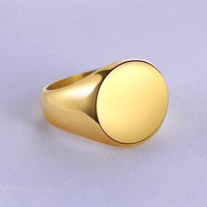 Polished gold-plated stainless steel signet ring with a round smooth flat surface