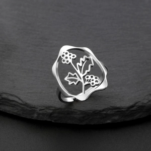 Bague ajourée en acier inoxydable argenté avec motifs floraux délicats sur pierre