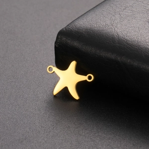 Vista macro de conector de estrella de mar de oro de 18K con doble ojal para DIY