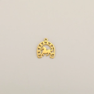Close-up of a 18K gold plated horseshoe pendant with a galloping horse silhouette