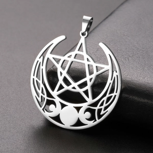 Macro detail of stainless steel triple moon pentagram pendant with Celtic knot patterns