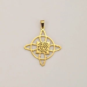 Detailed macro view of a gold-plated stainless steel rose and witch knot pendant