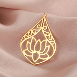 Gold stainless steel teardrop lotus pendant with hollow laser-cut design on silk fabric