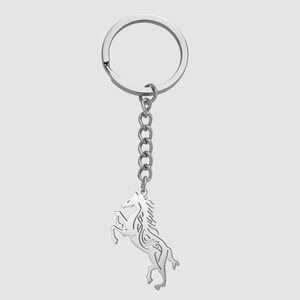 Detailed view of silver Celtic horse pendant on stainless steel keychain with mirror finish