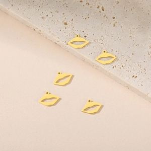Detailed view of five hollow gold-plated lip-shaped stainless steel jewelry charms