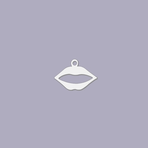 Macro view of a silver lip-shaped hollow charm for DIY jewelry and necklaces