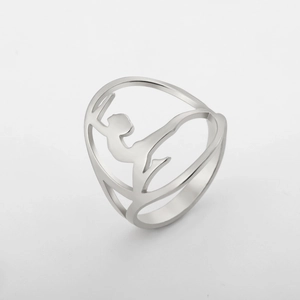 Detailed close-up of a silver gymnastics silhouette ring with polished hollow-out design