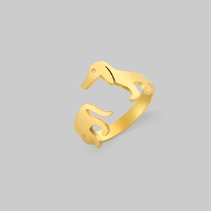 Close-up of golden dachshund animal wrap ring with a polished mirror finish surface