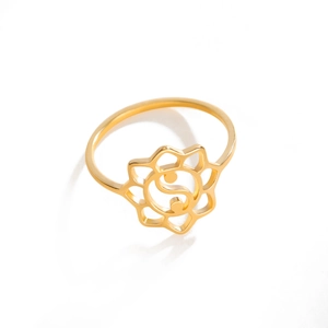 Gold hollow lotus Tai Chi ring made of stainless steel with elegant geometric cutouts