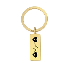 Customized golden stainless steel keychain with heart EKG design and letters Y and A