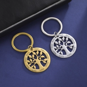 Customized Tree of Life keychains in gold and silver stainless steel with engraved names