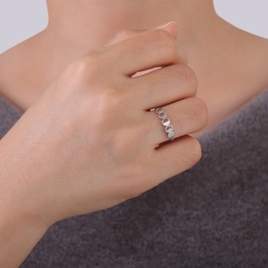 Minimalist silver stainless steel ring with 18K gold moon phase engraving on hand