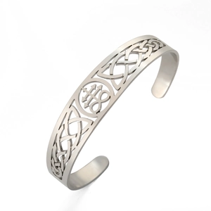 Detail view of silver stainless steel cuff featuring Leviathan Cross and Celtic knots