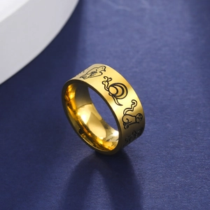 Golden stainless steel band ring with black engraved cartoon animal illustrations