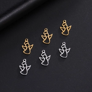 Detailed view of six hollow angel pendants in polished gold and silver stainless steel