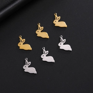Polished stainless steel rabbit pendant charms in gold and silver finish on black leather
