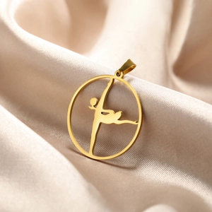 Gold rhythmic gymnastics pendant in stainless steel on champagne silk background