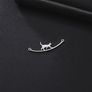 Minimalist silver cat silhouette pendant link for DIY jewelry making on black backdrop