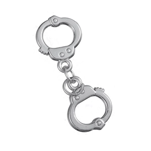 Close-up of silver zinc alloy handcuff charms for DIY jewelry and couple pendants