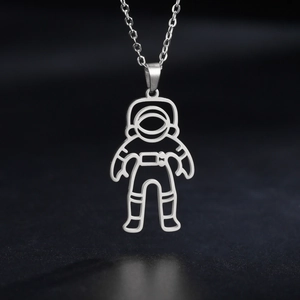 Polished silver 18K gold plated hollow astronaut pendant on a sleek metal chain