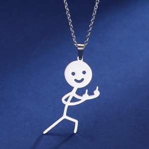 Close-up of a funny stickman pendant with a smiley face in polished stainless steel