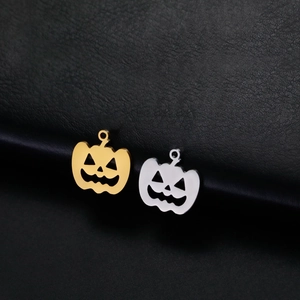 Ciondoli a zucca traforati in oro e argento per la creazione di gioielli di Halloween